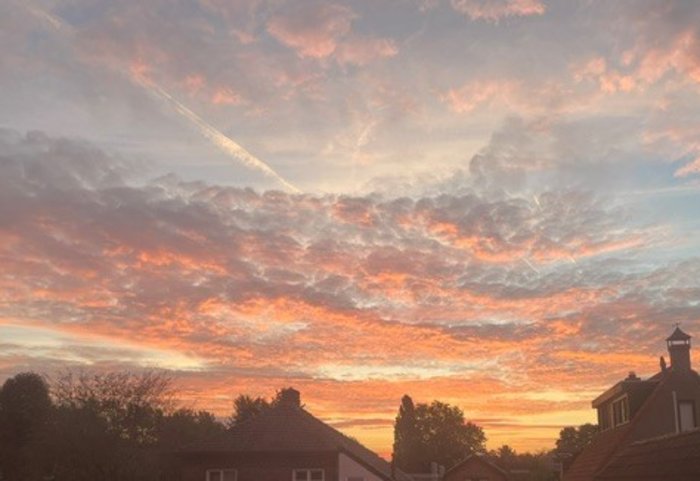 Sfeerfoto zonsondergang met skyline
