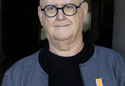 Ton Hofkens met zijn lintje